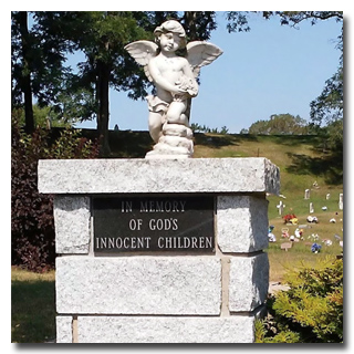 Photo of Garden Of Angels (statue of angel on stone pillar) at St. Peter's Cemtery, Lewiston