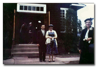 Ken and Pat Guillerm in front of the Pond's Chapel with May Bussell after a Sunday service