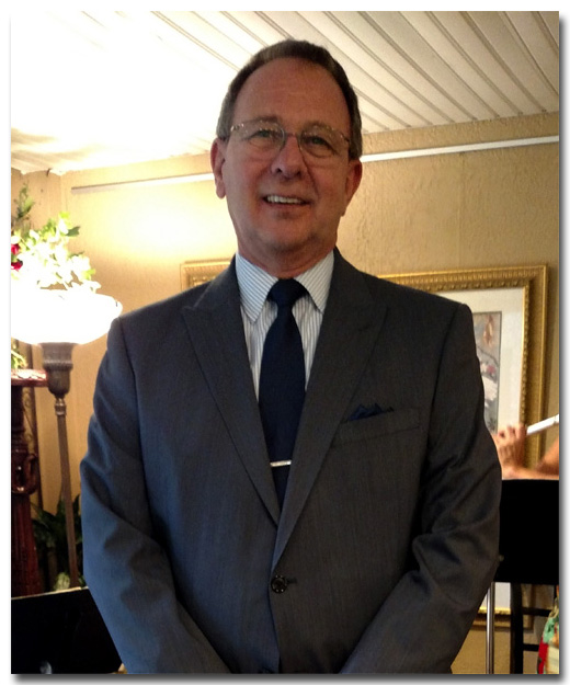 Formal Photo of Larry Lachance in a suit