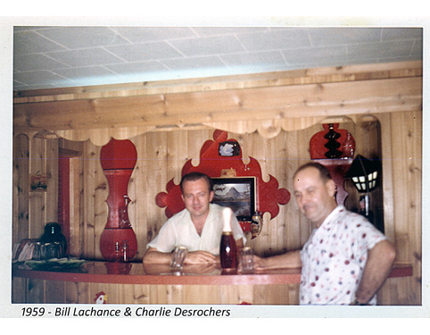 Bill Lachance and Charlie Desrochers standing at the bar in 1959